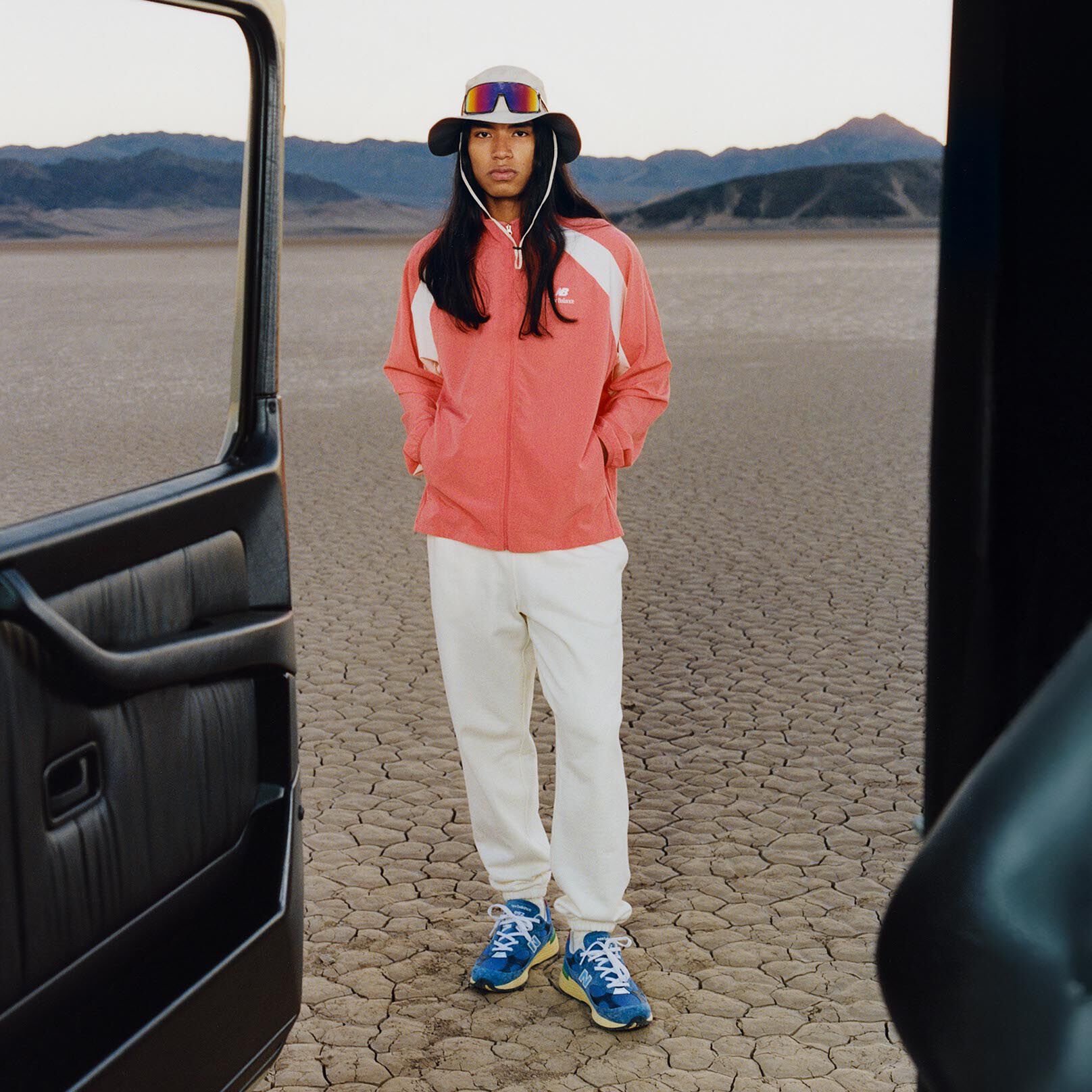 Man wearing a New Balance jacket in the desert